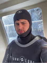 A man wearing a wetsuit 